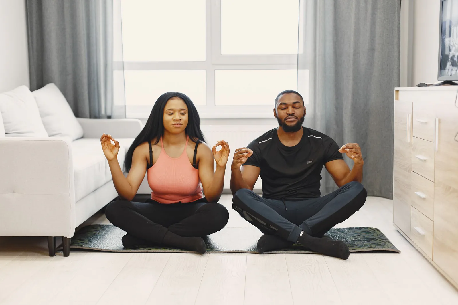 Friends practicing yoga together